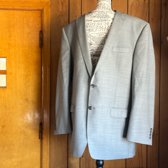 Calvin Klein men’s suit coat and pants. Grey. Jacket 44L.